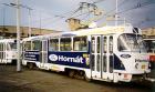 Reklamní polep tramvaje, řezaná grafika, Plzeň 2001